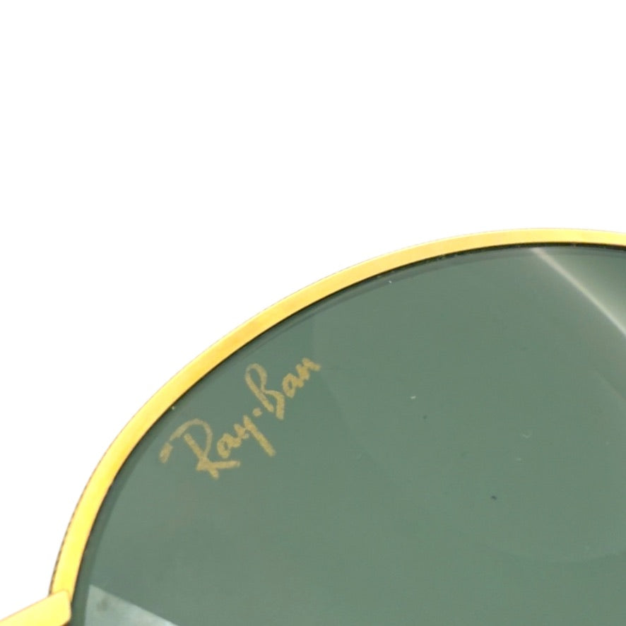 [75] Ray-Ban sunglasses, gold